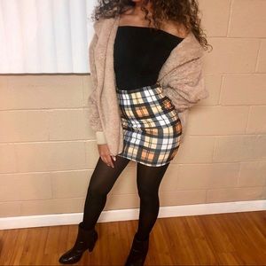 Yellow plaid skirt from Pretty Little Thing